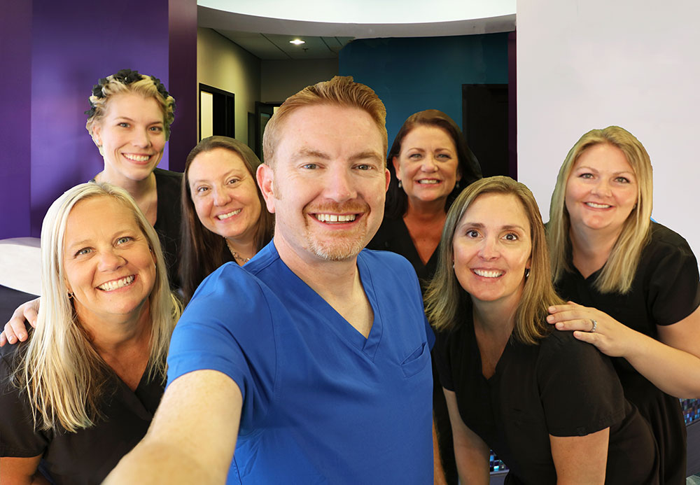 Beacon Dental staff standing in the lobby